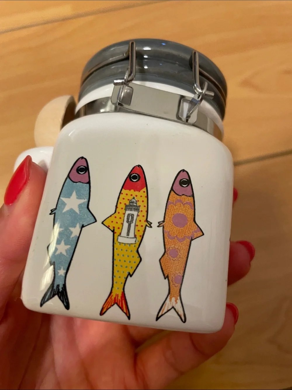 White Ceramic Fish Treat Jar with Colorful Fish Design